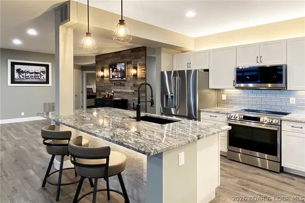 $670,000 | 147 Evergreen Condo Drive, Unit 1A, Sunrise Beach, MO 65079