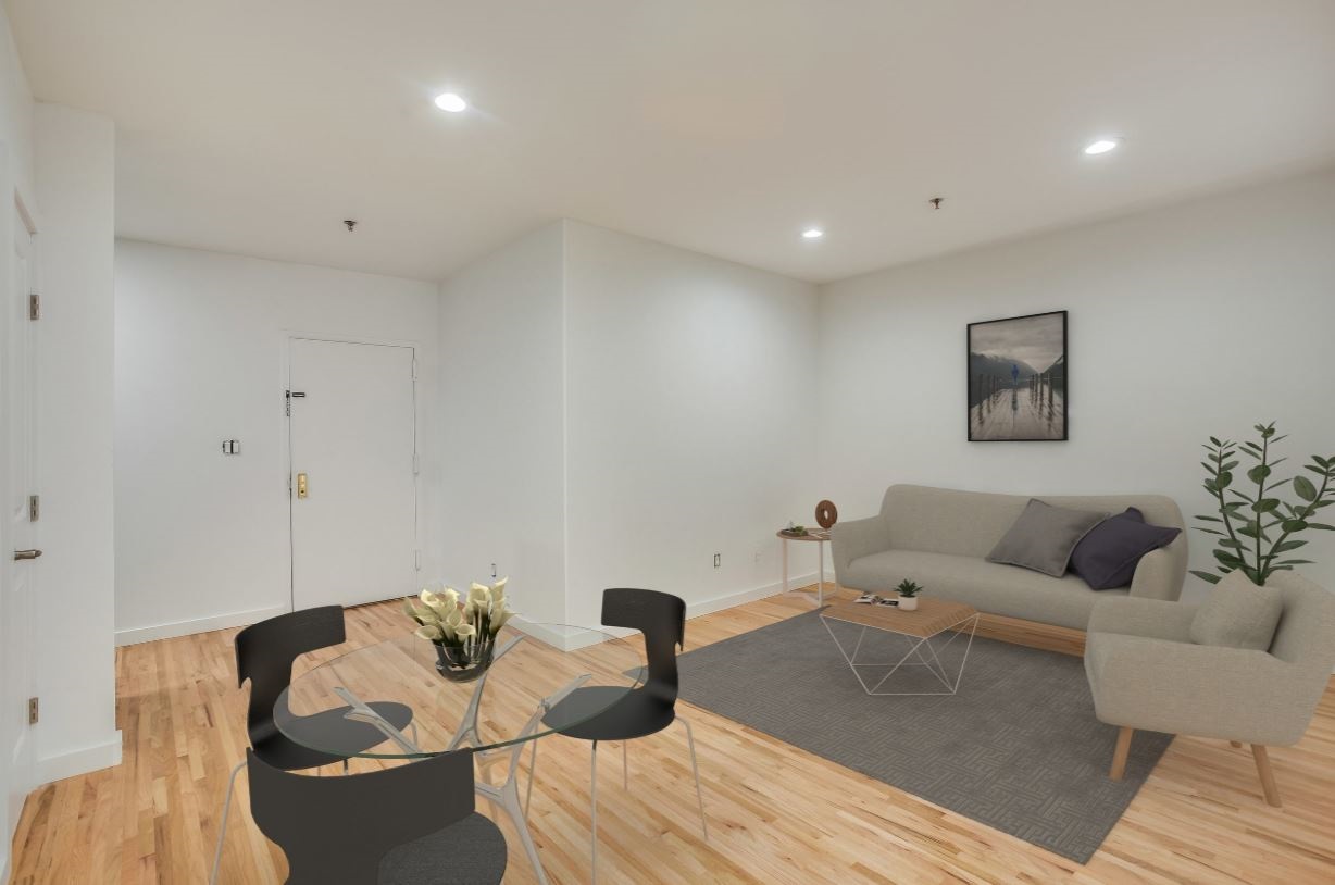 204 Grand Street, Unit 2C Hoboken, NJ 07030 - Photo 2 of 14 a living room with furniture