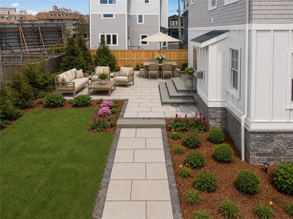 6 Sharon Court Newport, RI 02840 - Photo 5 of 49 Large patio off the kitchen area. Digitally staged