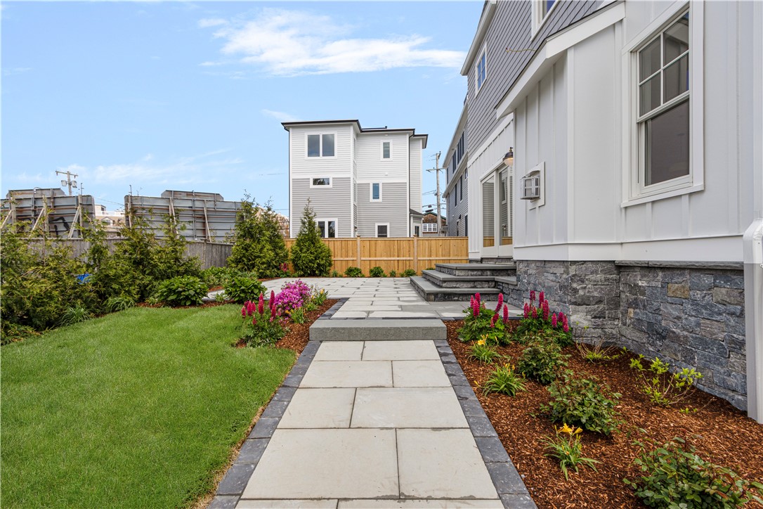 6 Sharon Court Newport, RI 02840 - Photo 6 of 49 Paver walkway from street to large patio area
