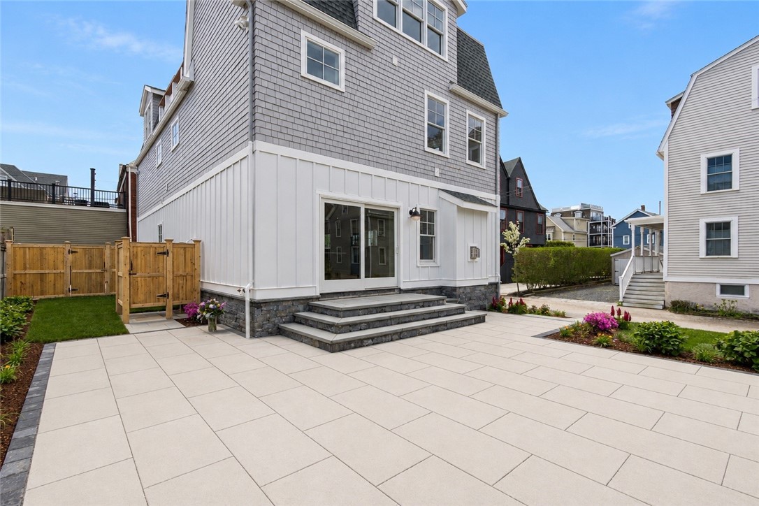 6 Sharon Court Newport, RI 02840 - Photo 7 of 49 Large patio. Outdoor shower behind house with gas connection for grill