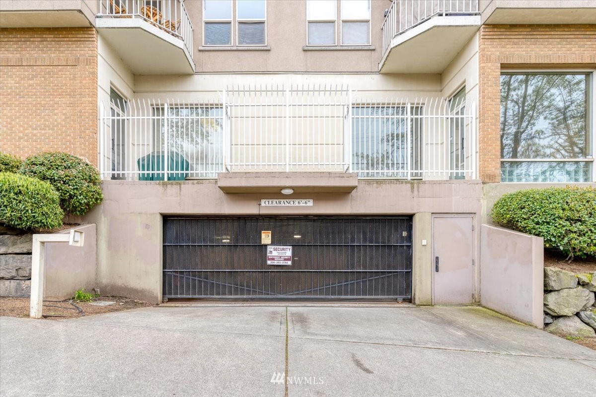 506 East Howell Street, Unit 108 Seattle, WA 98122 - Photo 19 of 20 a front view of a house with a garage