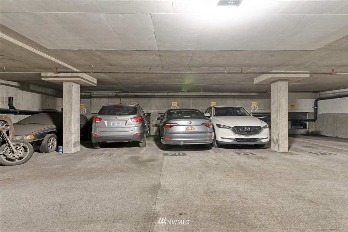 506 East Howell Street, Unit 108 Seattle, WA 98122 - Photo 20 of 20 a view of parking garage with cars