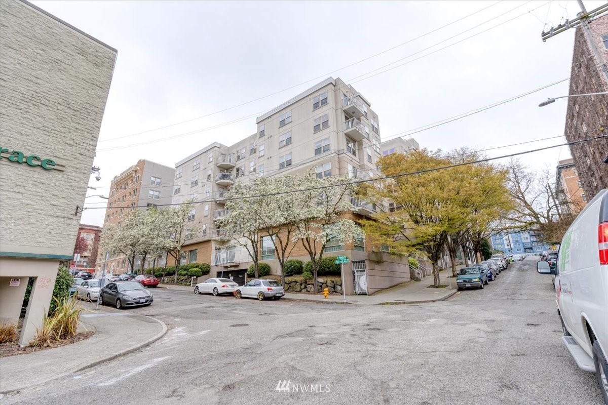 506 East Howell Street, Unit 108 Seattle, WA 98122 - Photo 2 of 20 a view of a street with cars