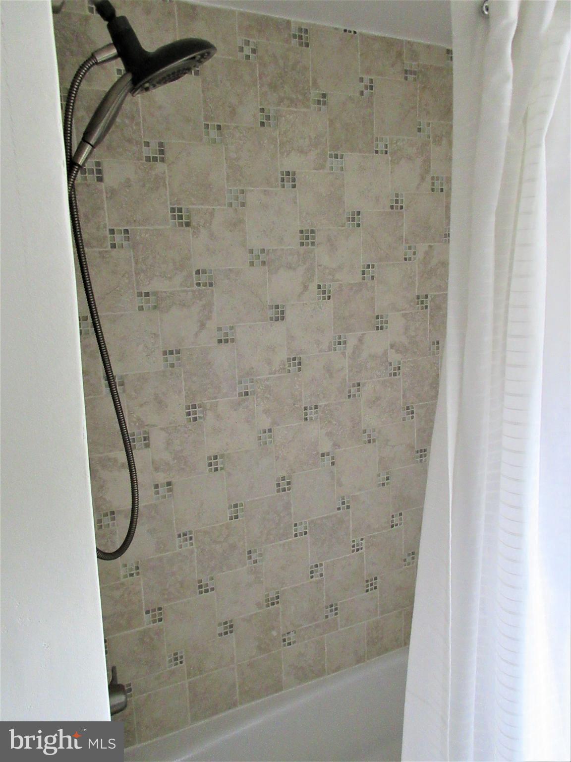 447 West Maple Road Linthicum Heights, MD 21090 - Photo 24 of 39 Custom tile work