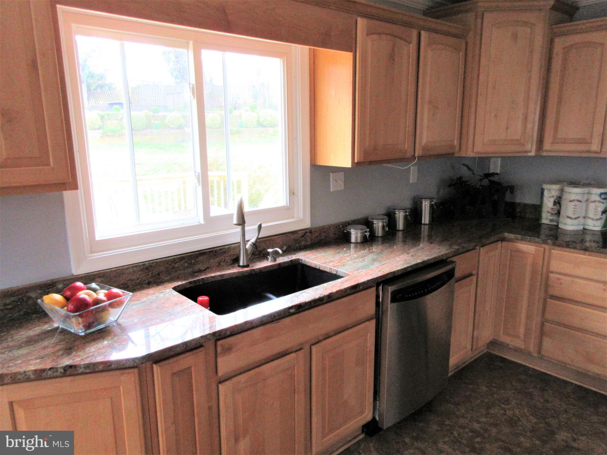 447 West Maple Road Linthicum Heights, MD 21090 - Photo 9 of 39 Granite counters, gas stove