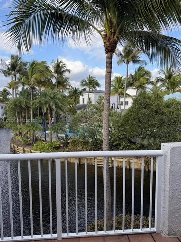 an empty room with wooden floor