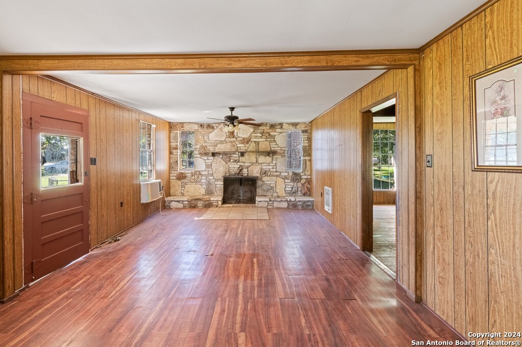 6268 Highway 27 Center Point, TX 78010 - Photo 22 of 39 a view of empty room with wooden floor