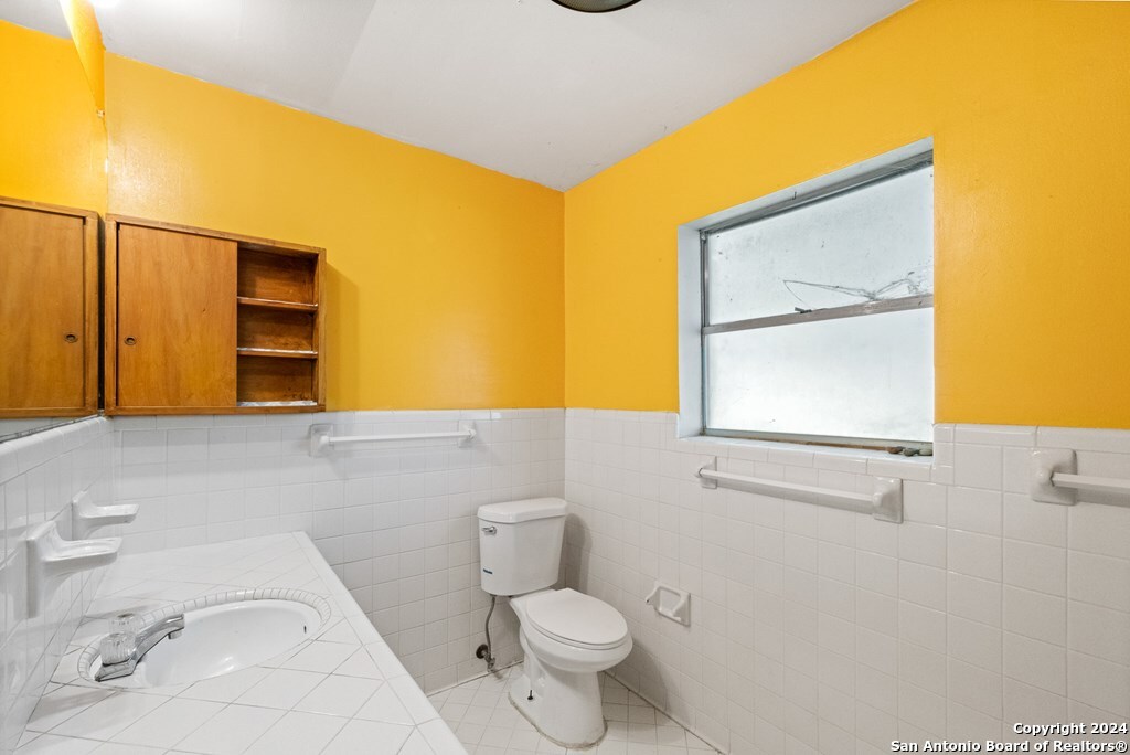 6268 Highway 27 Center Point, TX 78010 - Photo 26 of 39 a bathroom with a sink and a toilet