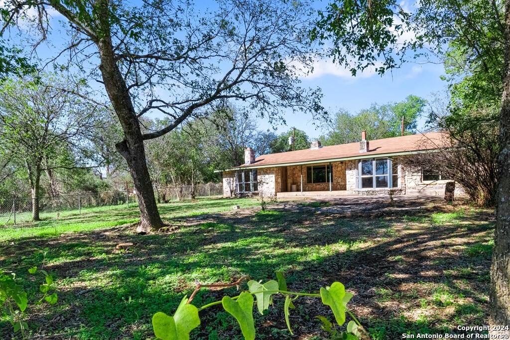 6268 Highway 27 Center Point, TX 78010 - Photo 30 of 39 a front view of house with yard and green space