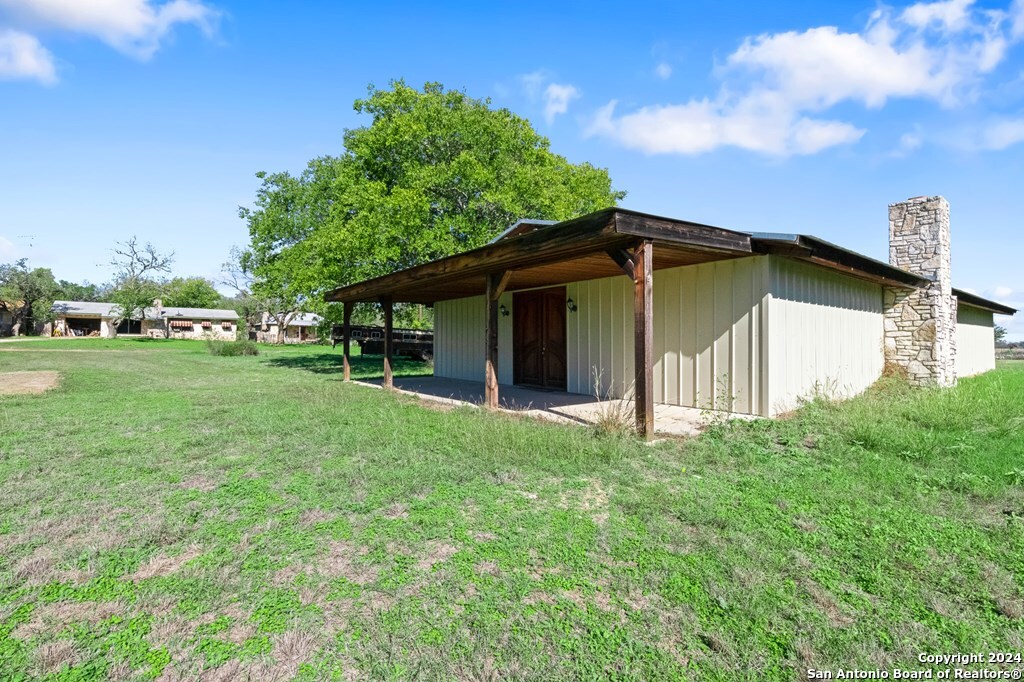 6268 Highway 27 Center Point, TX 78010 - Photo 3 of 39 a view of a house with backyard