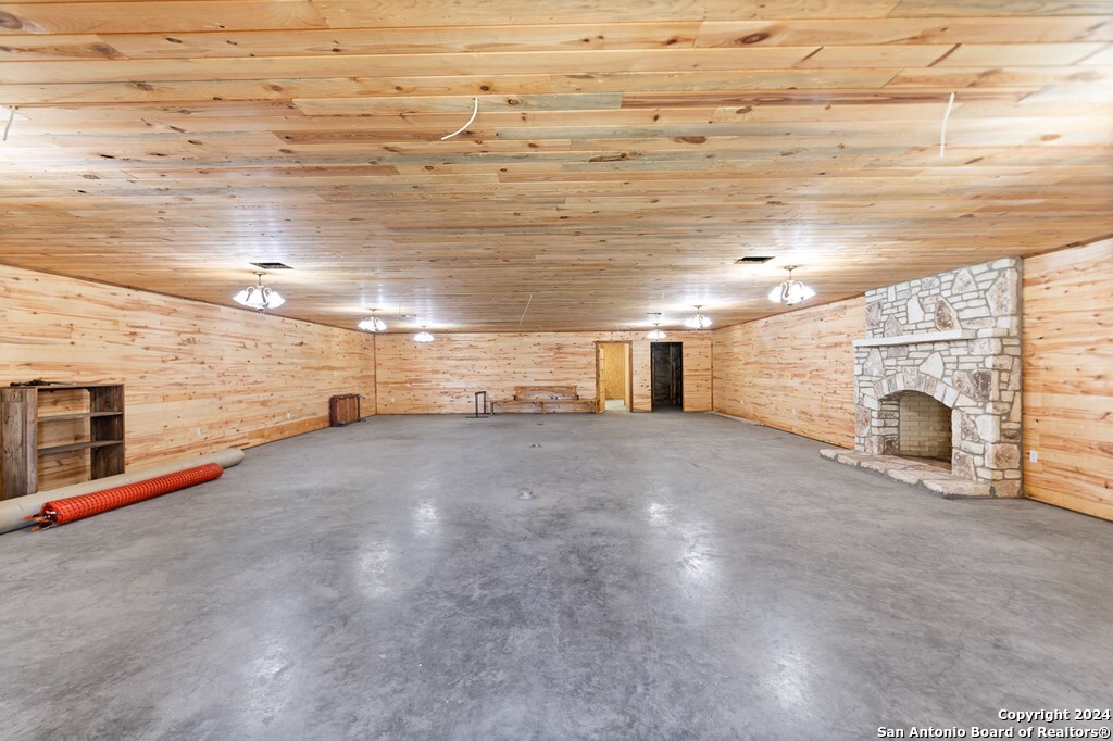 6268 Highway 27 Center Point, TX 78010 - Photo 6 of 39 a view of a empty room with a fireplace