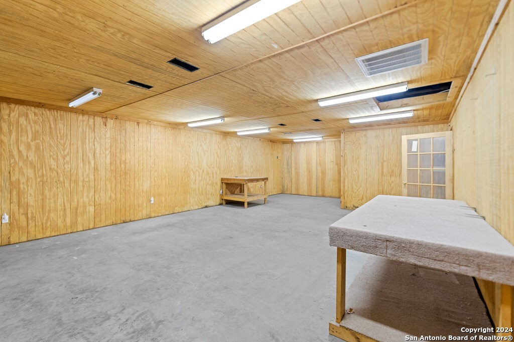 6268 Highway 27 Center Point, TX 78010 - Photo 7 of 39 a room with furniture and a table