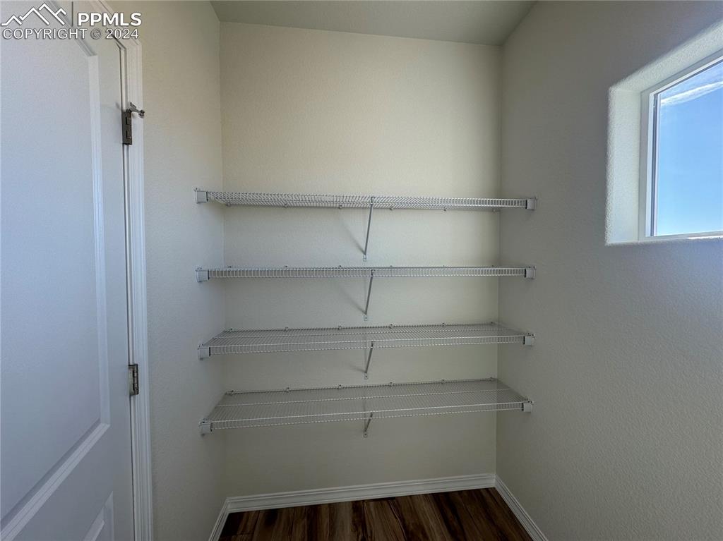 8082 Jayla Trail Peyton, CO 80831 - Photo 12 of 20 a view of a room with shelf