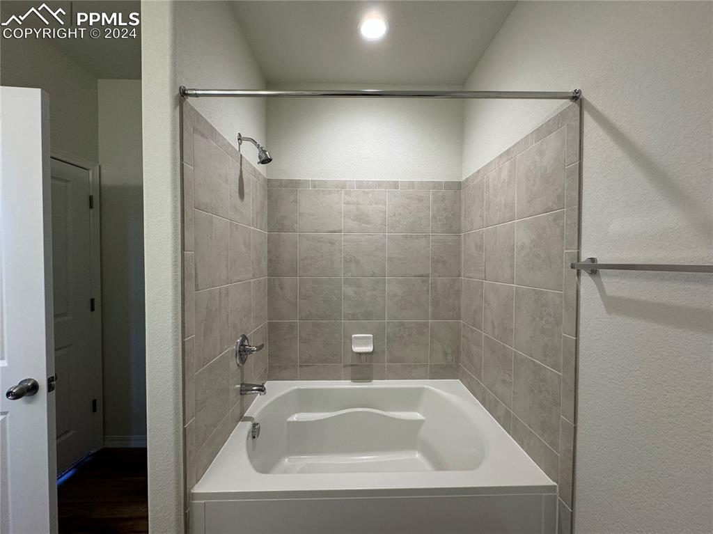 8082 Jayla Trail Peyton, CO 80831 - Photo 20 of 20 a bathroom with a tub