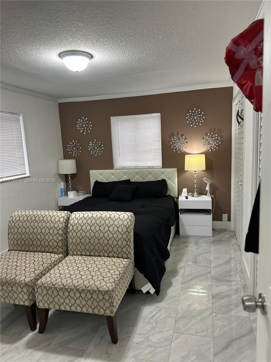 5710 Douglas Street Hollywood, FL 33021 - Photo 11 of 21 a living room with furniture and a couch