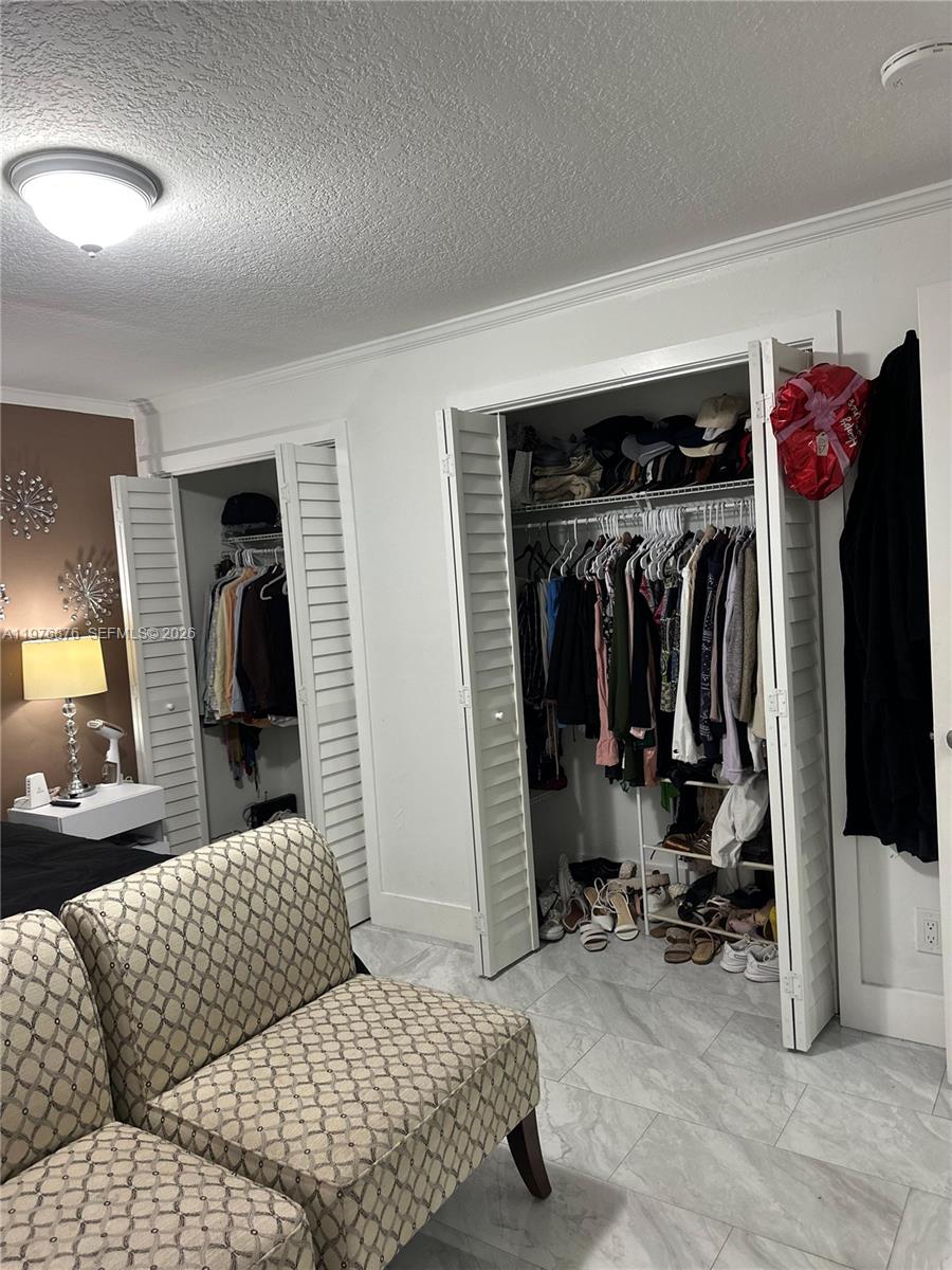 5710 Douglas Street Hollywood, FL 33021 - Photo 13 of 21 a view of walk in closet