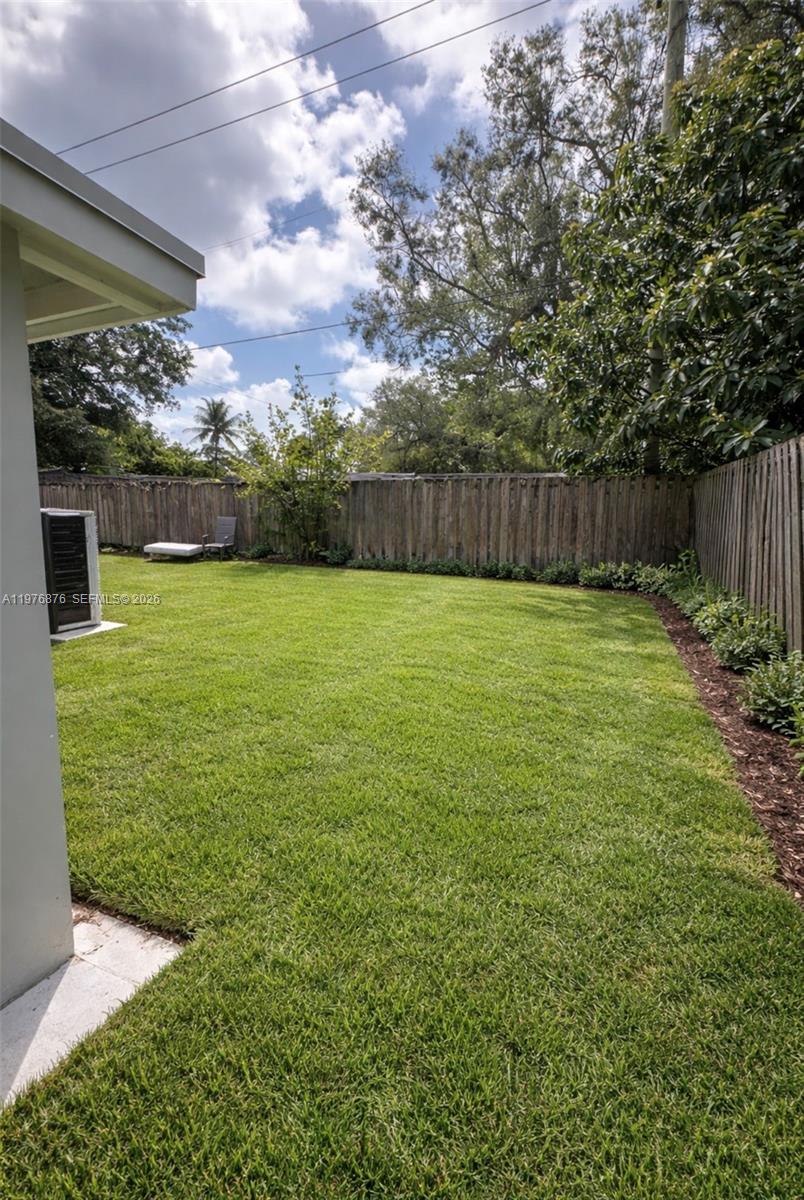 5710 Douglas Street Hollywood, FL 33021 - Photo 18 of 21 a view of a yard with an outdoor space