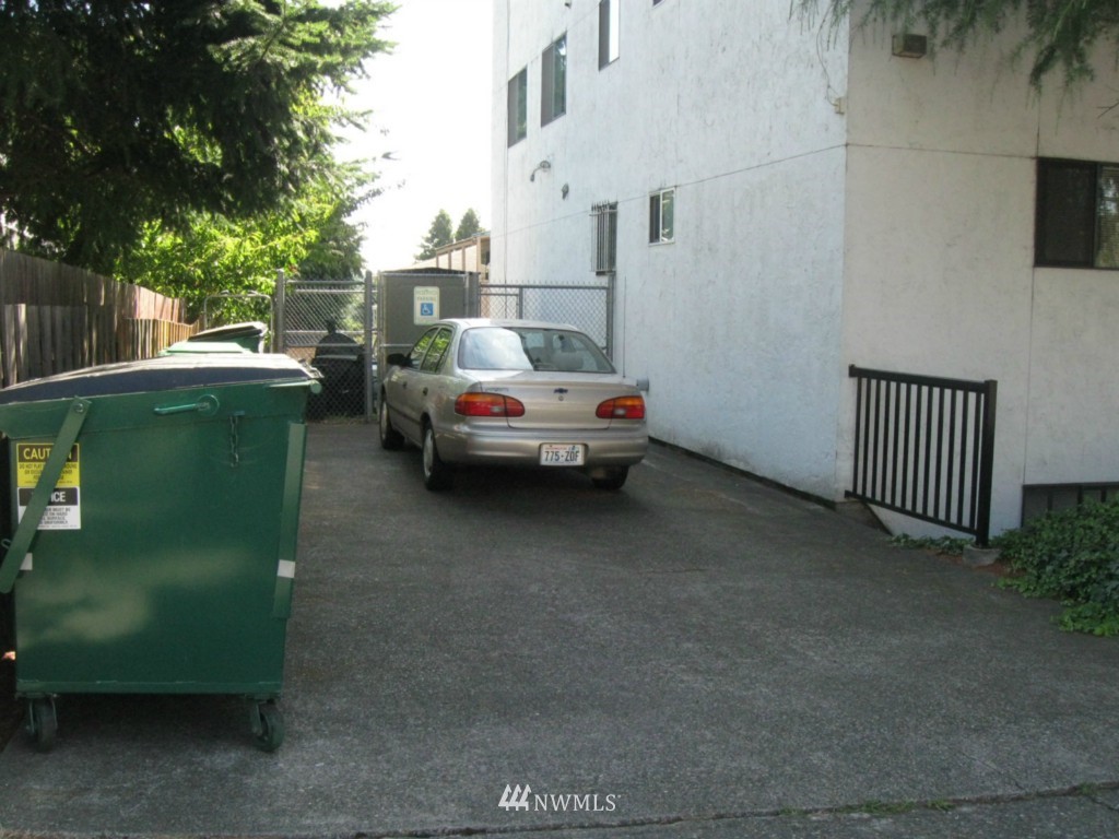 8500 Linden Avenue North Seattle, WA 98103 - Photo 15 of 17 a view of backyard with outdoor seating and green space
