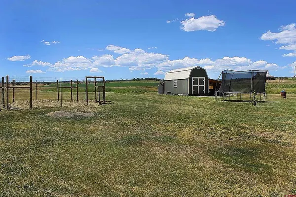 a view of a water fountain and an ocean view