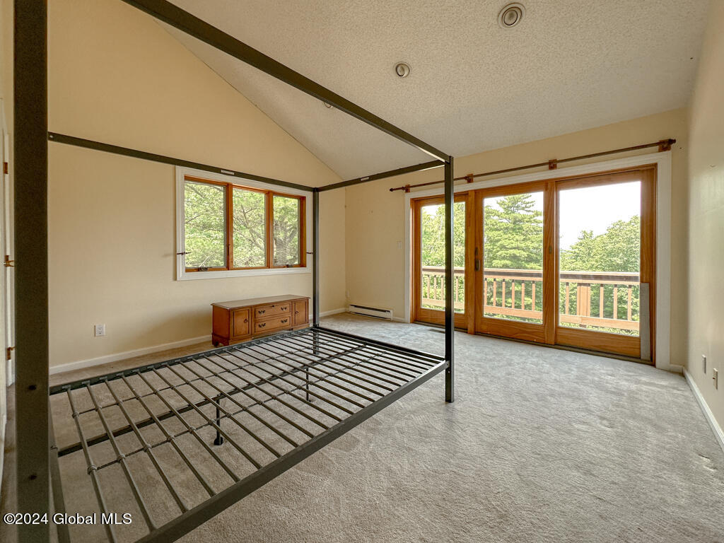 441 Lockhart Mountain Road, Unit 1 Lake George, NY 12845 - Photo 28 of 43 Primary bedroom