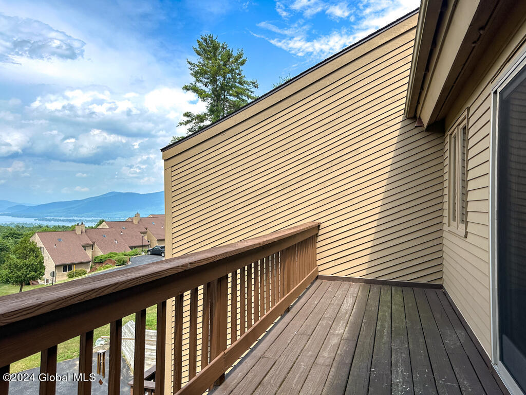 441 Lockhart Mountain Road, Unit 1 Lake George, NY 12845 - Photo 29 of 43 Primary bedroom deck