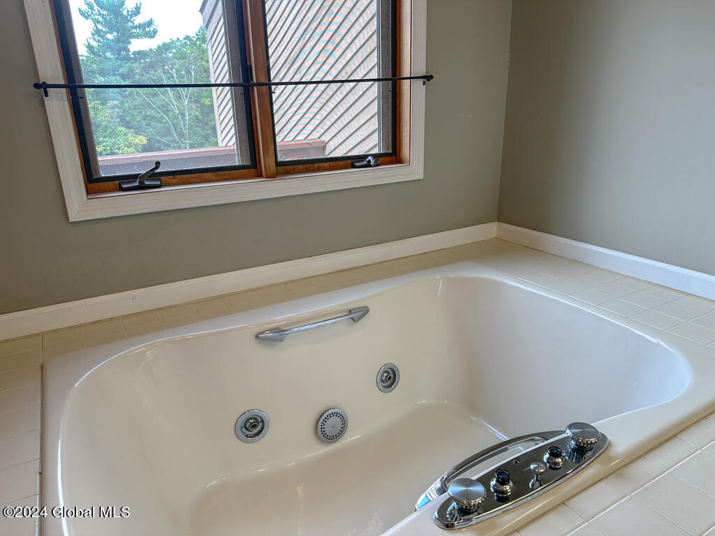 441 Lockhart Mountain Road, Unit 1 Lake George, NY 12845 - Photo 31 of 43 Soaking tub