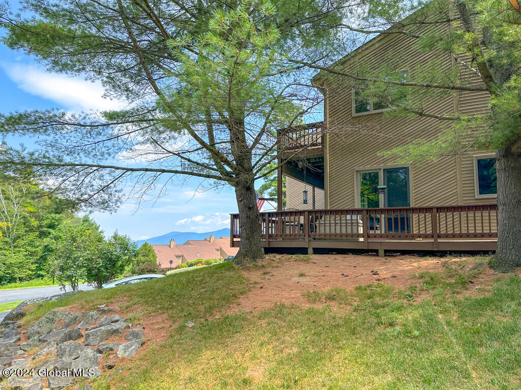 441 Lockhart Mountain Road, Unit 1 Lake George, NY 12845 - Photo 34 of 43 Wrap around deck