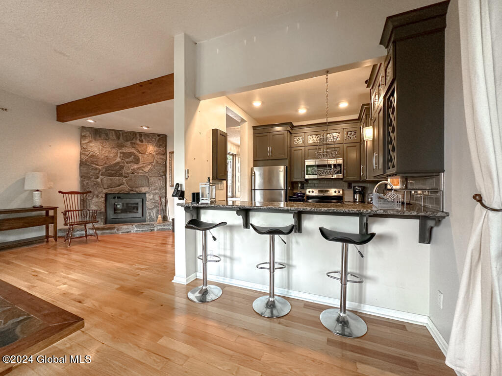 441 Lockhart Mountain Road, Unit 1 Lake George, NY 12845 - Photo 9 of 43 Open kitchen