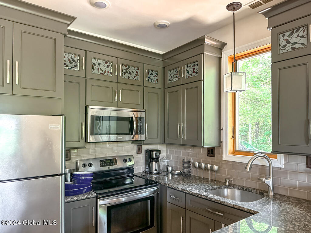 441 Lockhart Mountain Road, Unit 1 Lake George, NY 12845 - Photo 10 of 43 Granite counters