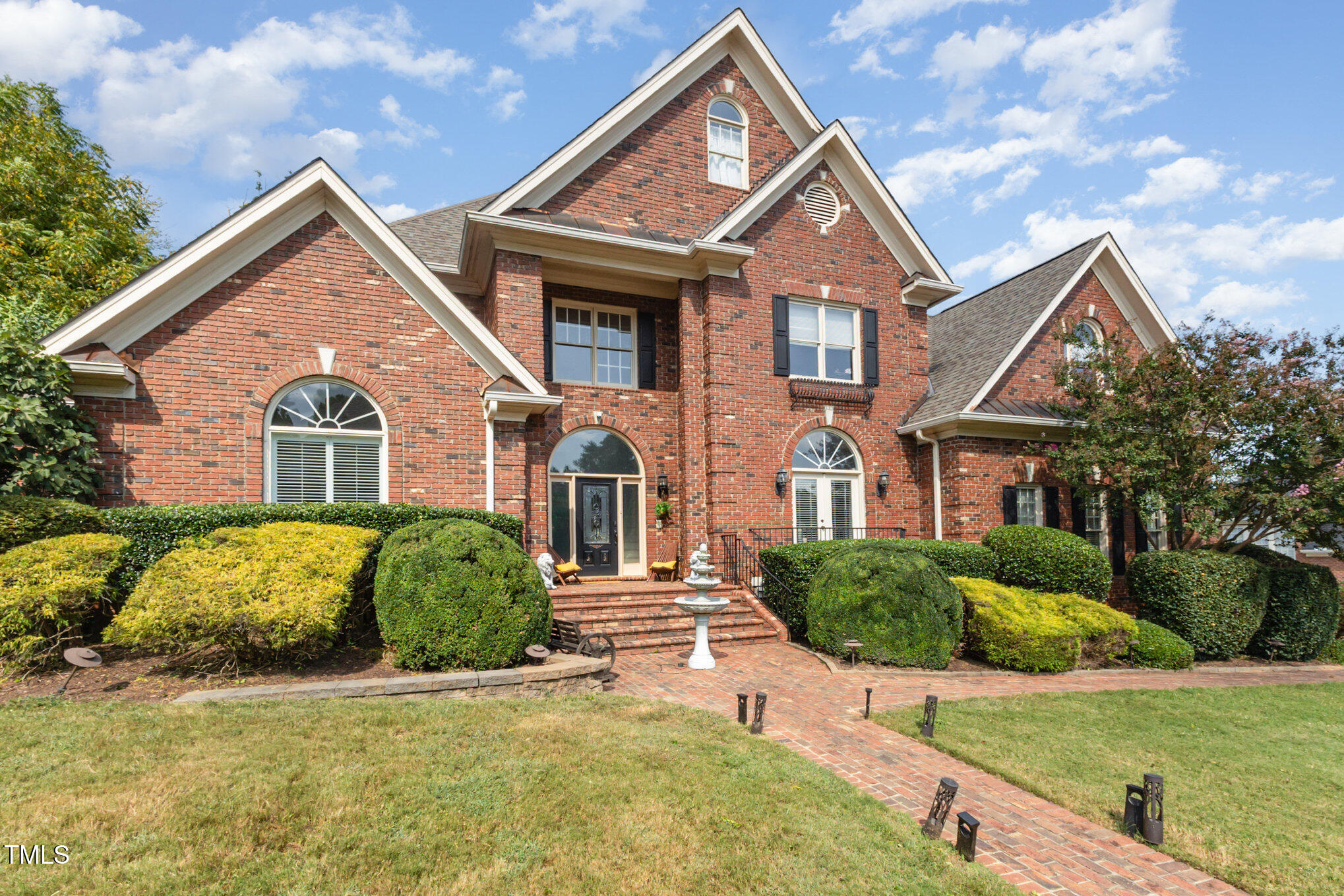 12617 Richmond Run Drive Raleigh, NC 27614 - Photo 2 of 77 a front view of a house with a yard