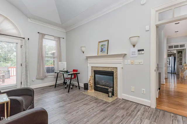 a white toilet sitting next to a bath tub