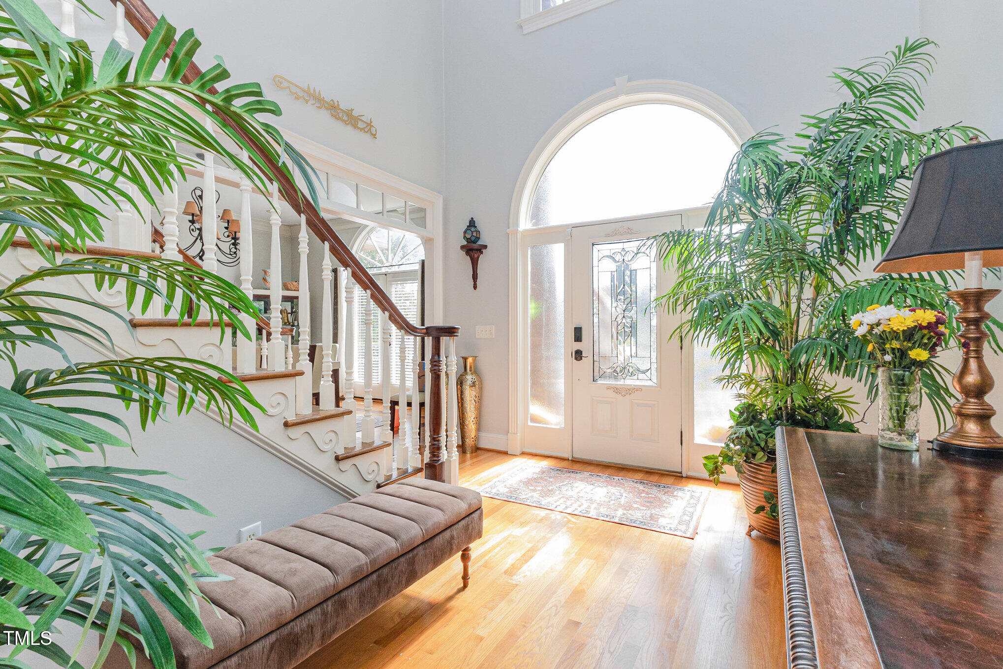 12617 Richmond Run Drive Raleigh, NC 27614 - Photo 4 of 77 a view of entryway with wooden floor and a potted plant