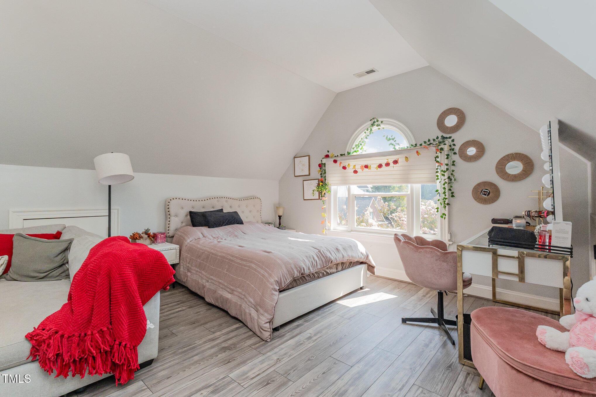 12617 Richmond Run Drive Raleigh, NC 27614 - Photo 41 of 77 a spacious bedroom with a bed and a table