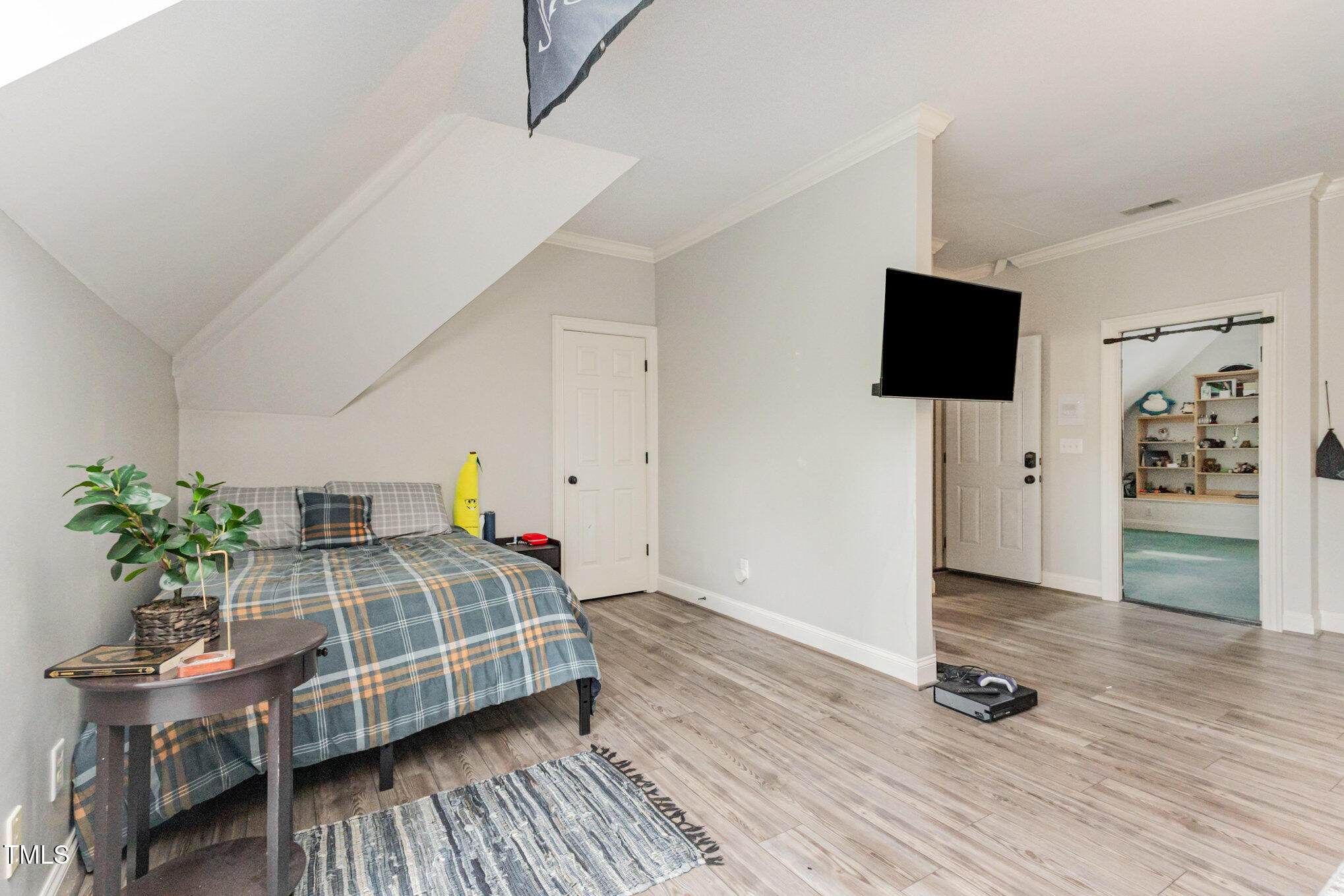 12617 Richmond Run Drive Raleigh, NC 27614 - Photo 52 of 77 a bedroom with furniture and a bed