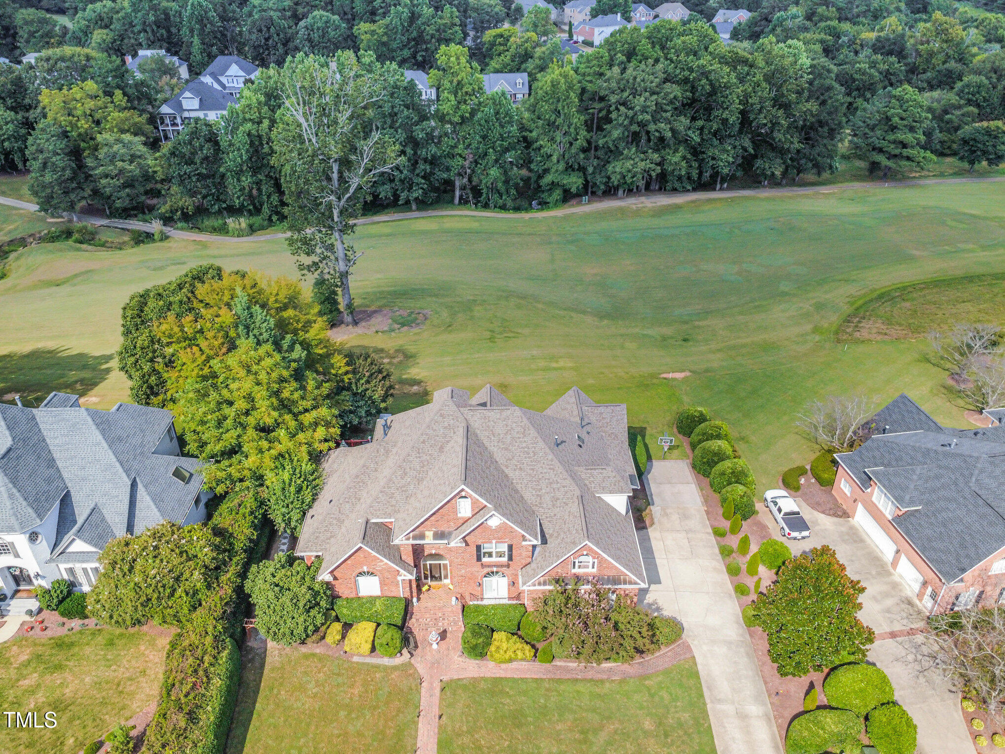 12617 Richmond Run Drive Raleigh, NC 27614 - Photo 67 of 77 an aerial view of a house with a garden and lake view