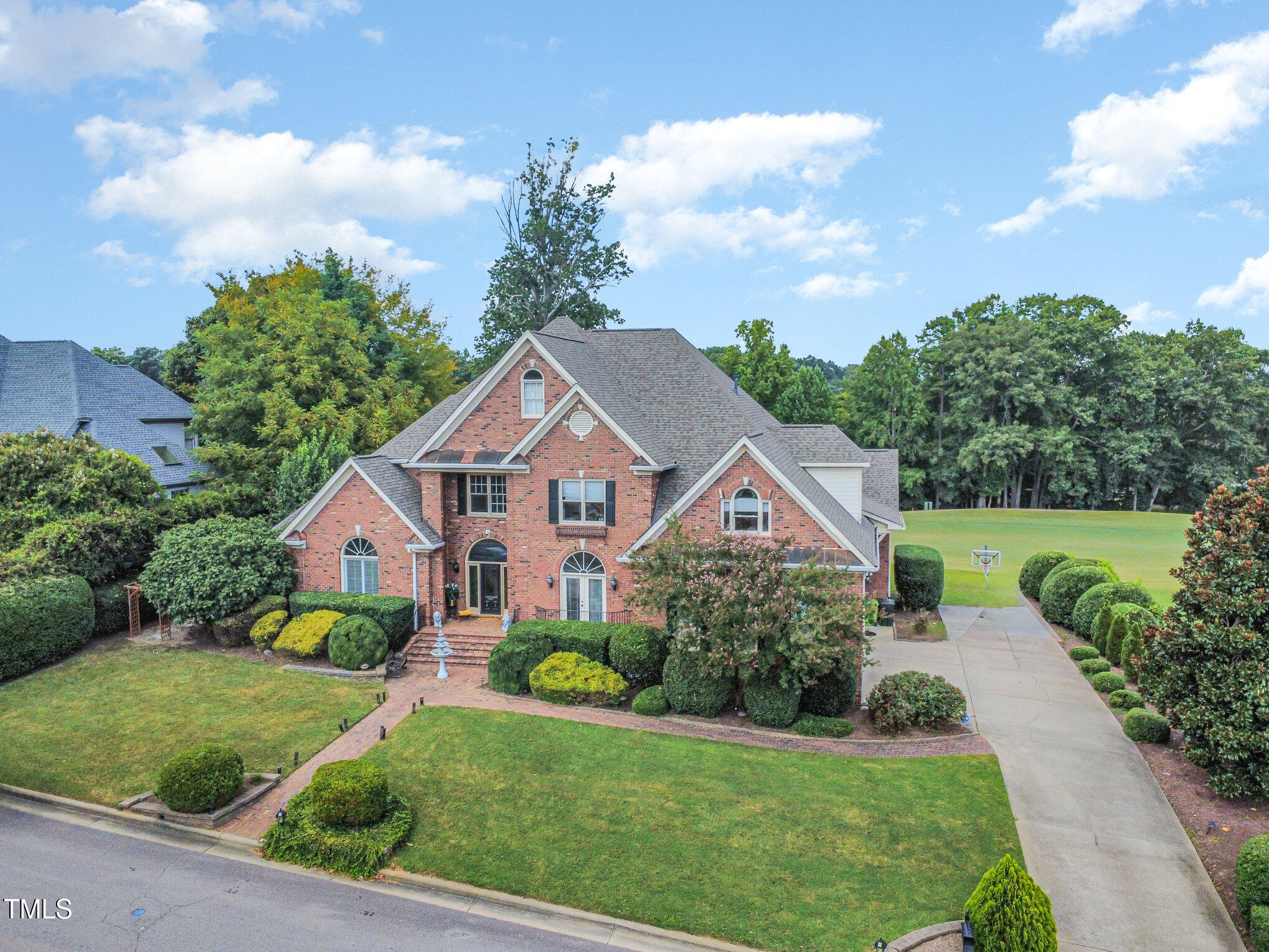 12617 Richmond Run Drive Raleigh, NC 27614 - Photo 72 of 77 a front view of a house with garden
