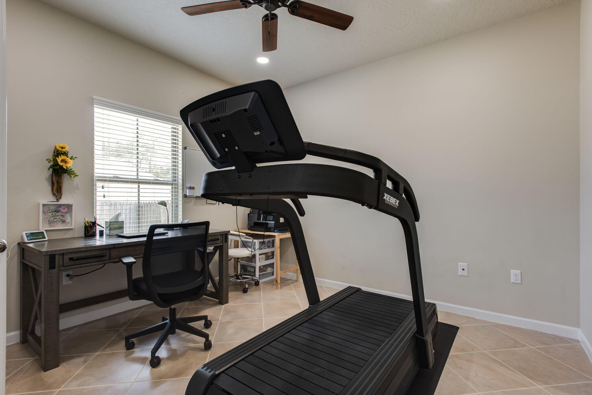4600 Hermosa Road Crestview, FL 32539 - Photo 22 of 28 a view of a workspace with furniture and a window