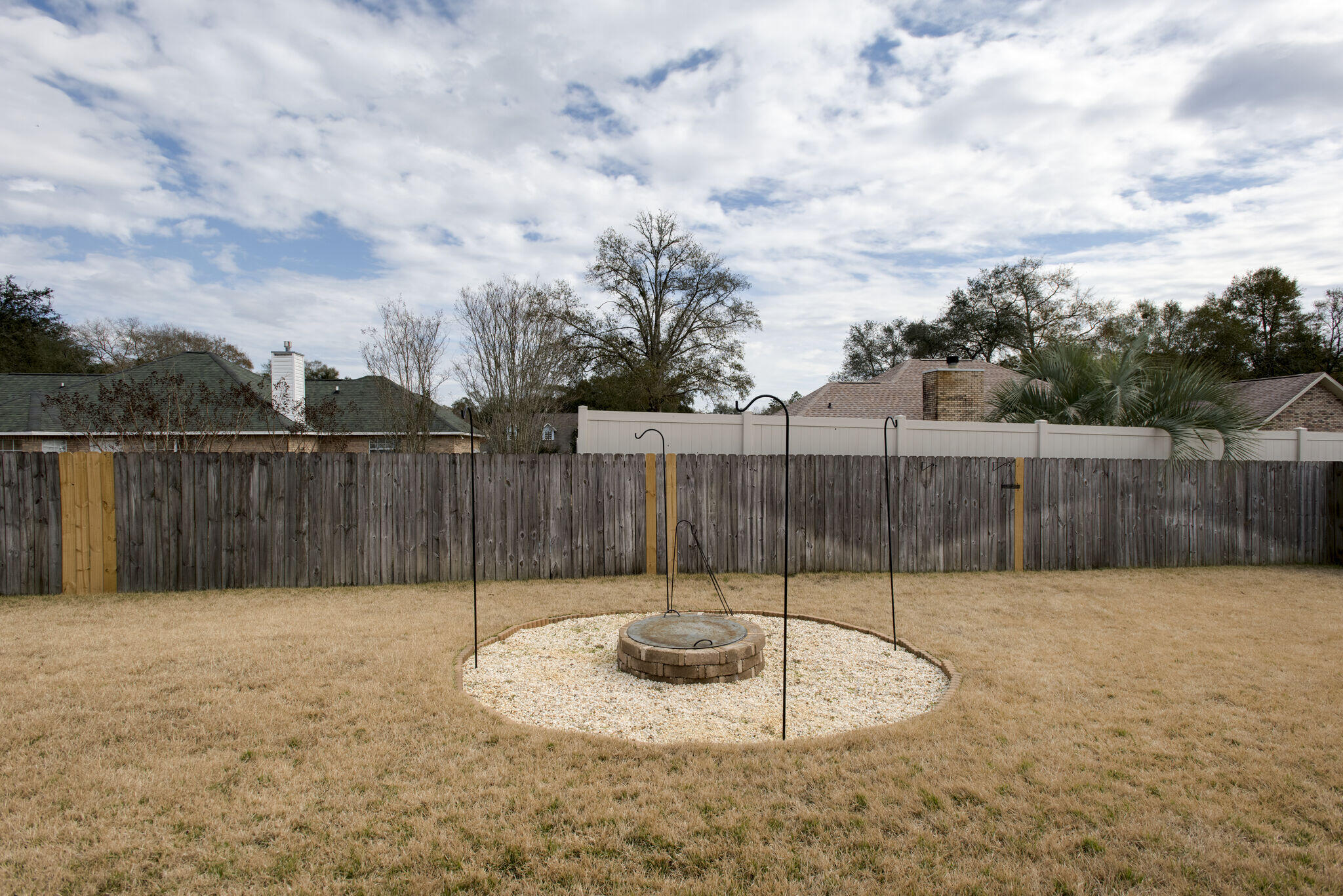 4600 Hermosa Road Crestview, FL 32539 - Photo 26 of 28 a view of a backyard with fence