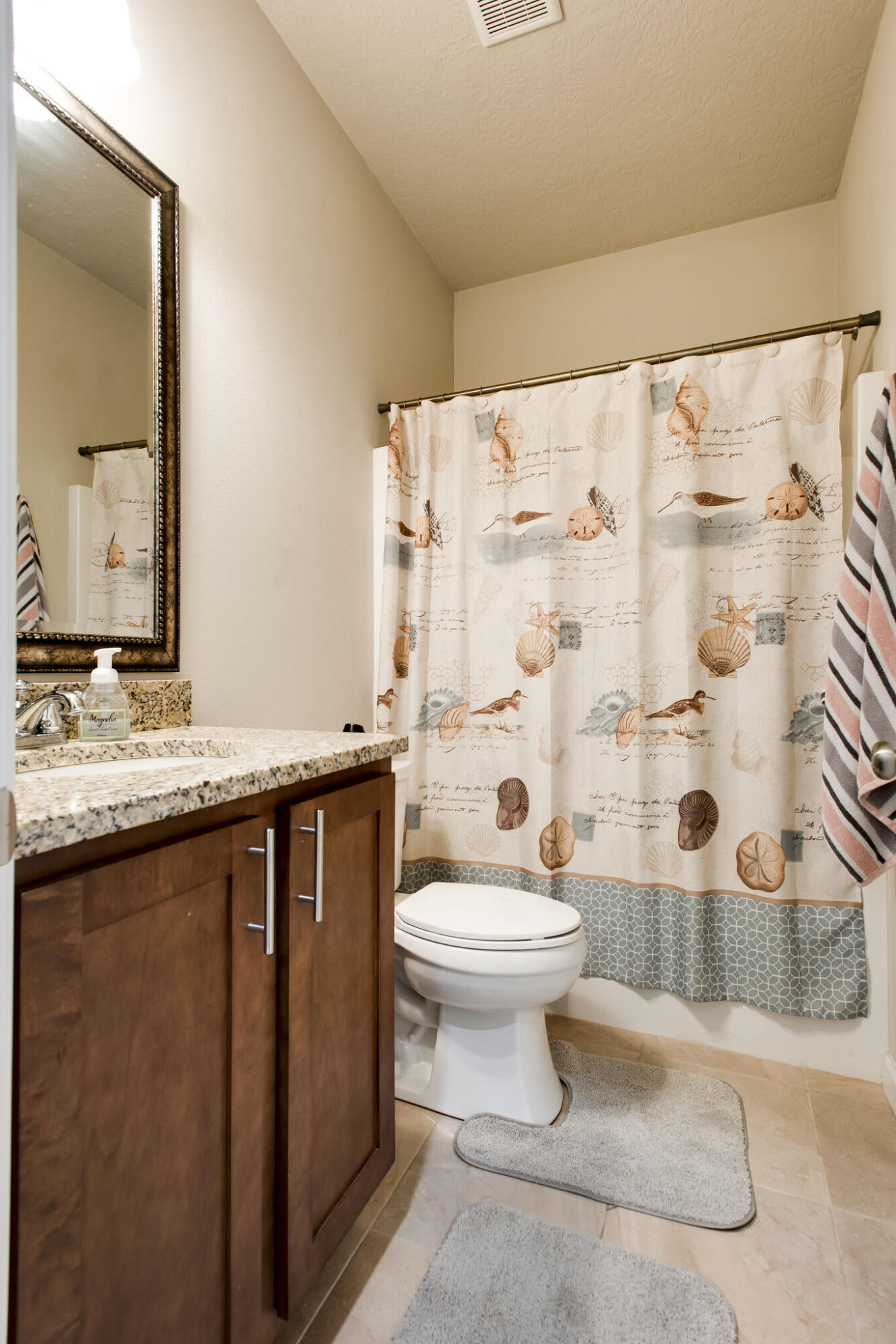 4600 Hermosa Road Crestview, FL 32539 - Photo 6 of 28 a bathroom with a sink toilet and shower