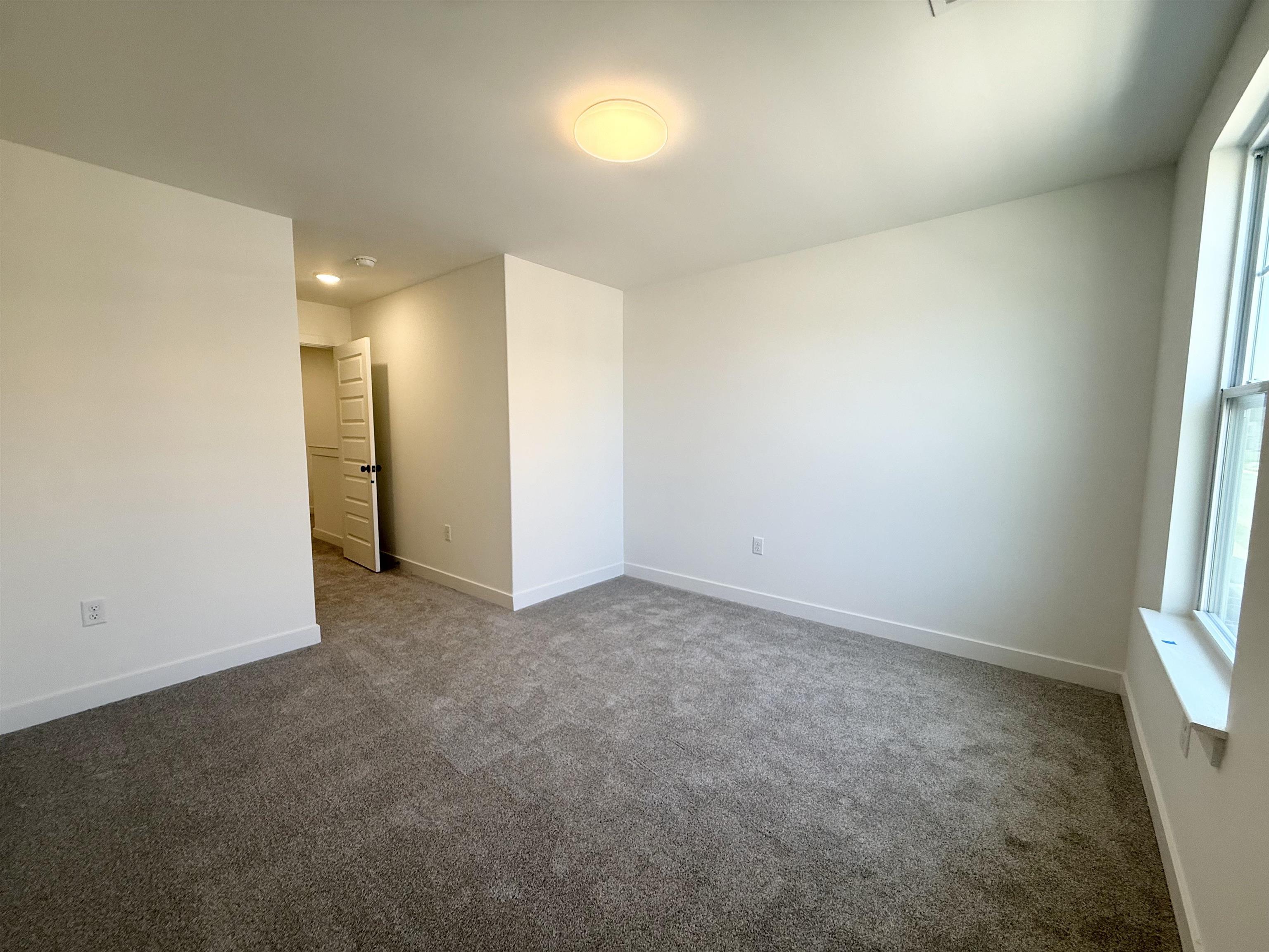 3060 Portage Drive Bartlett, TN 38133 - Photo 14 of 21 an empty room with windows and entrance