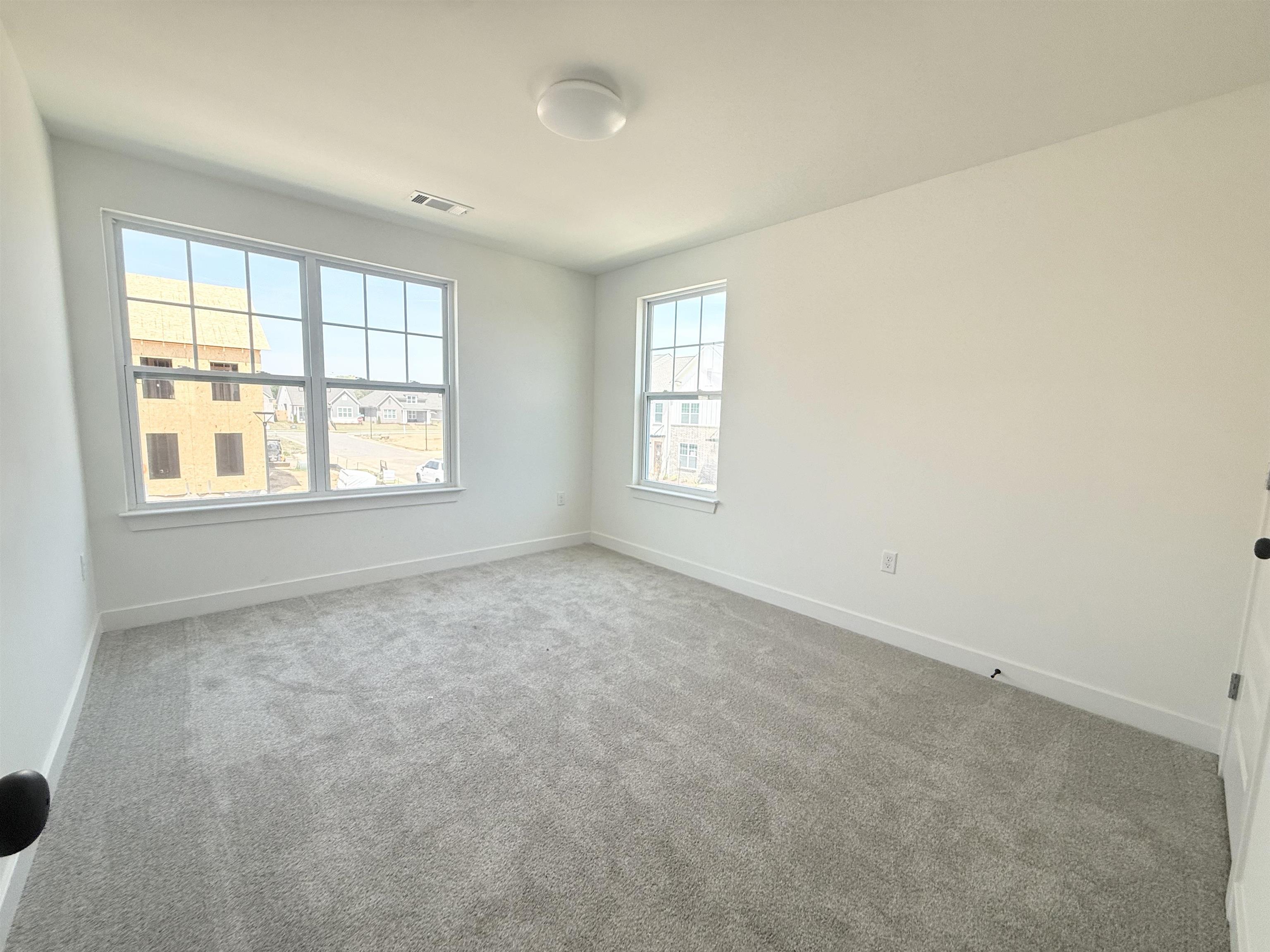 3060 Portage Drive Bartlett, TN 38133 - Photo 17 of 21 an empty room with windows