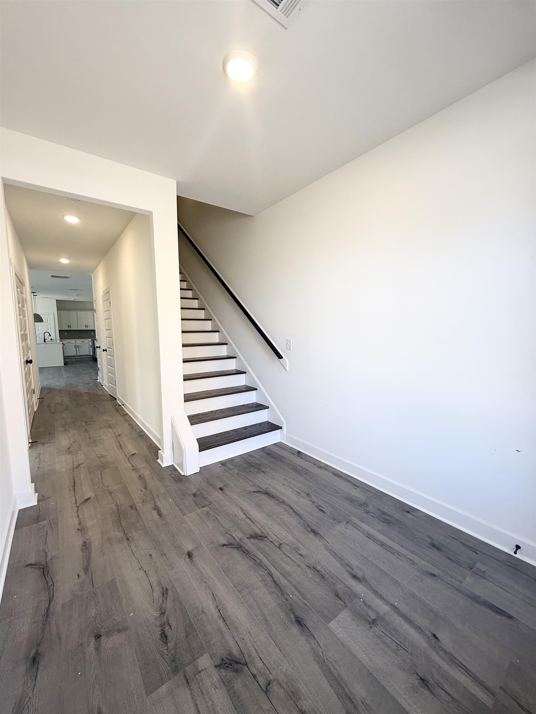 3060 Portage Drive Bartlett, TN 38133 - Photo 2 of 21 a view of a hallway with wooden floor