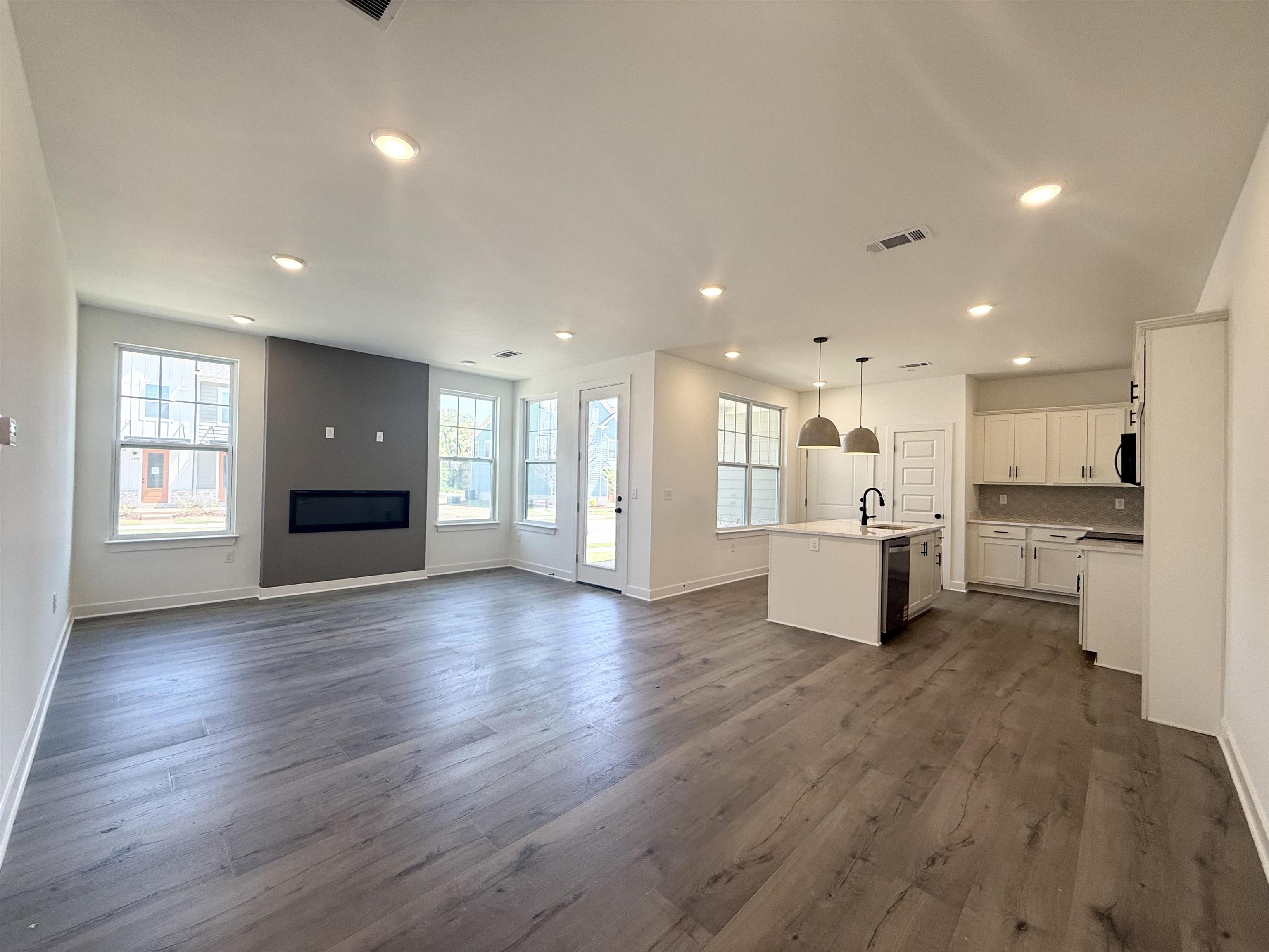 3060 Portage Drive Bartlett, TN 38133 - Photo 10 of 21 a view of a big room with wooden floor and windows