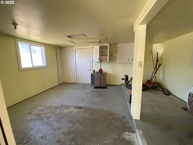 a view of entryway and workspace