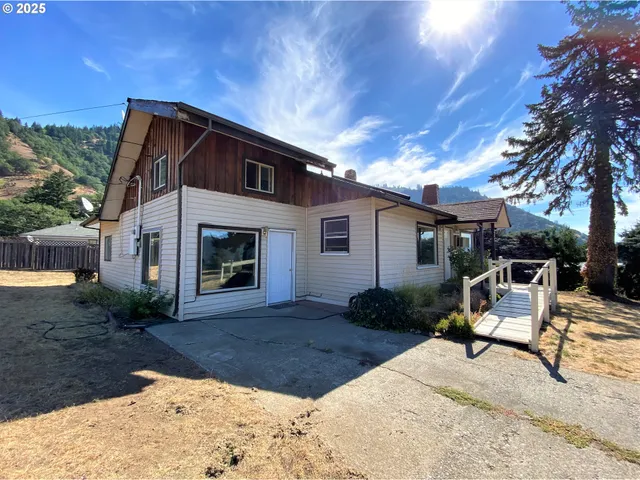a backyard of a house with seating space