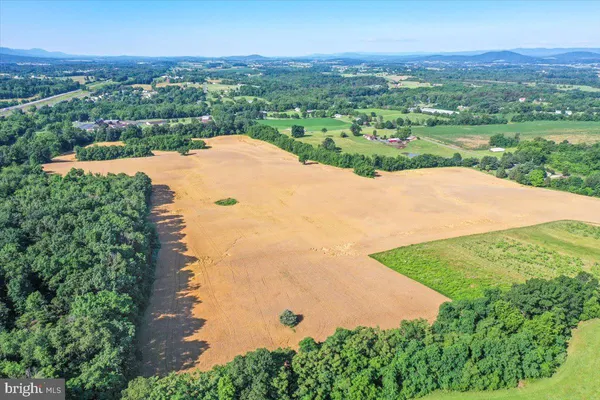 an aerial view of a house with a garden