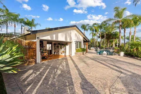 a view of a house with a patio