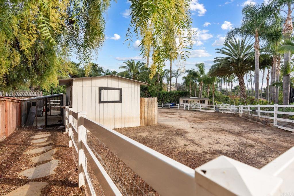 612 Lucylle Lane Encinitas, CA 92024 - Photo 32 of 47 a view of a backyard with large trees