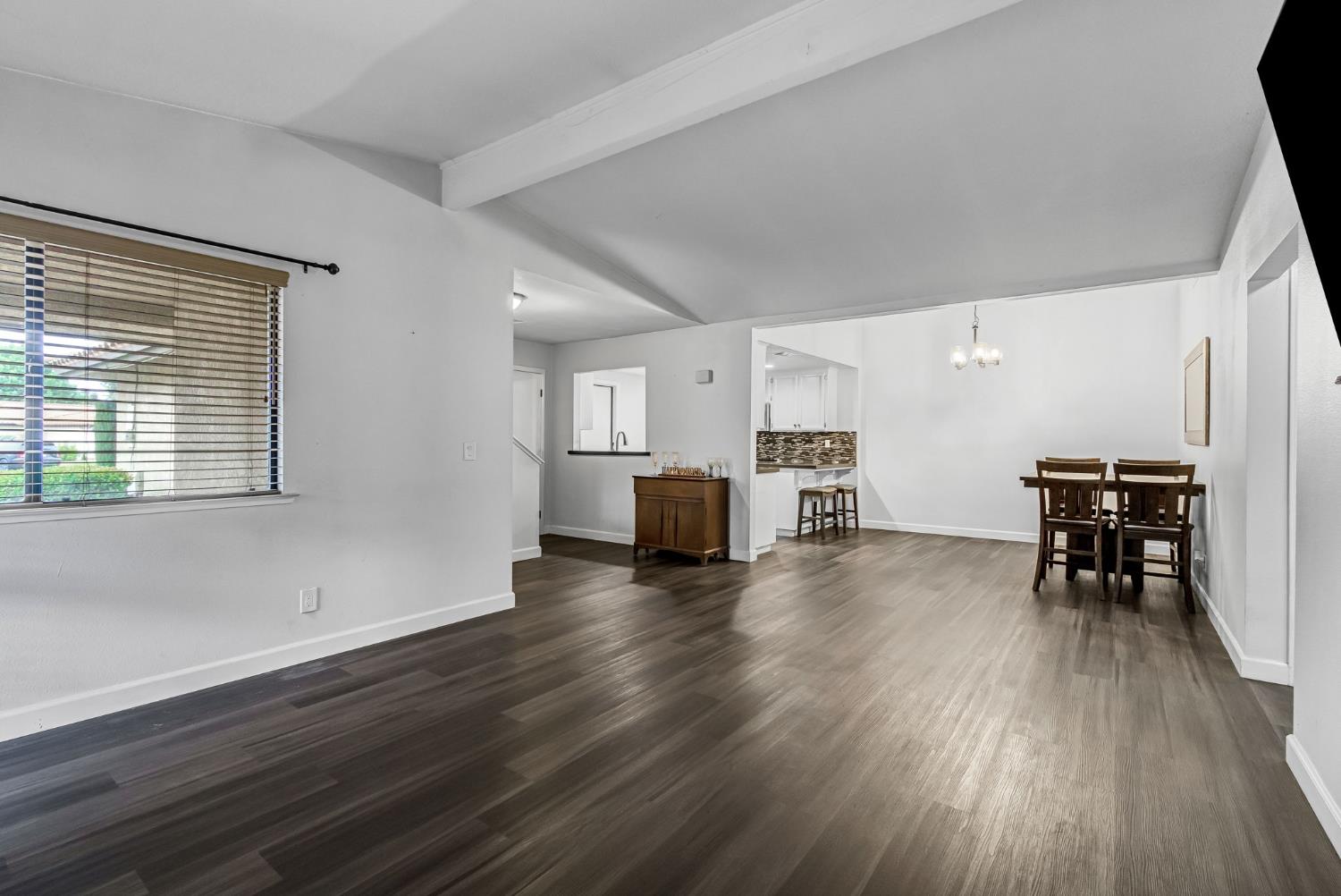 901 Valley Way Madera, CA 93637 - Photo 8 of 42 a view of kitchen with furniture and wooden floor